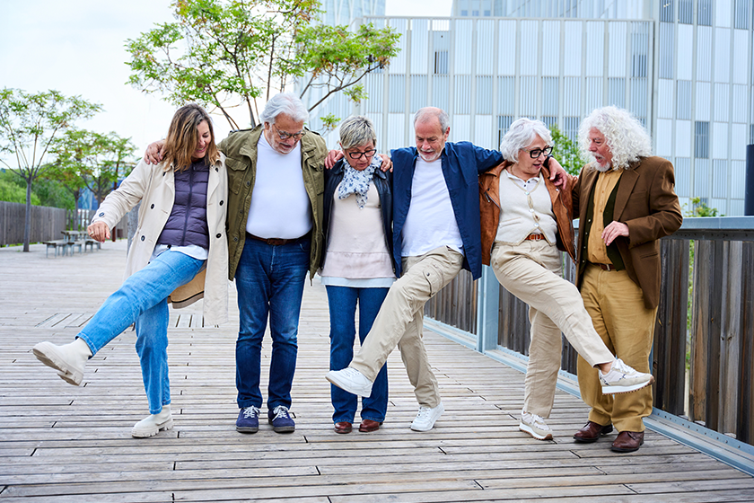 Group of mature Caucasian people playing fun