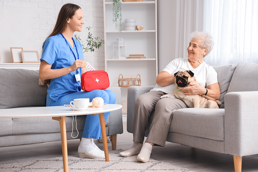 senior-woman-pug-dog-doctor-sitting